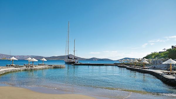 The private beach at Elounda Peninsula All Suite Hotel